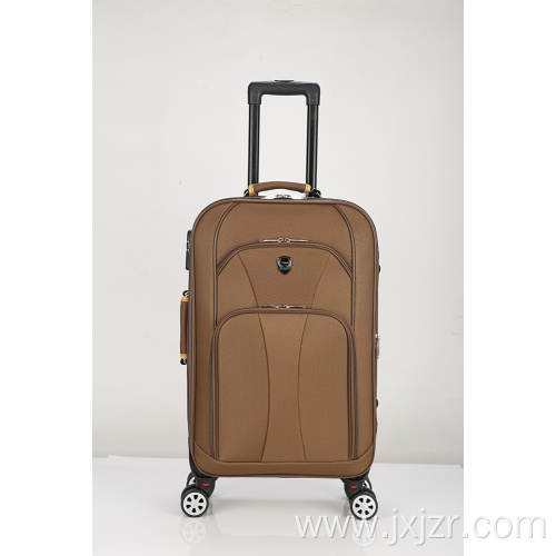 Front pocket spinner luggage